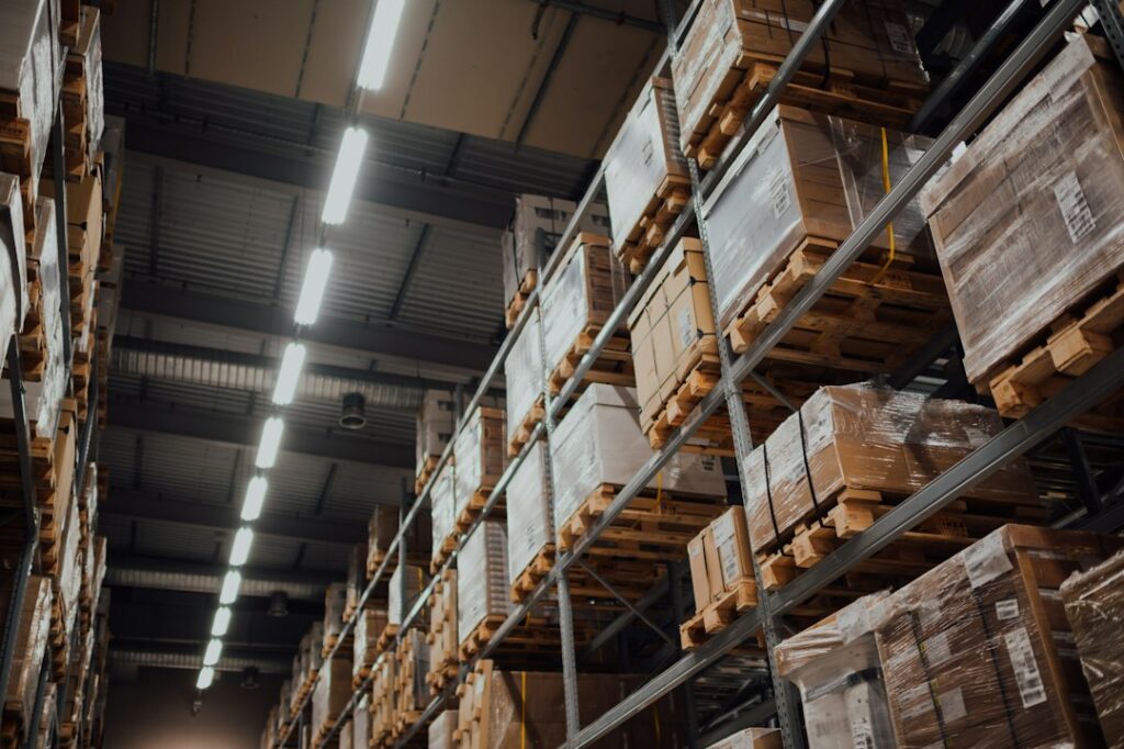 Warehouse racks and goods illustrating commercial activity.