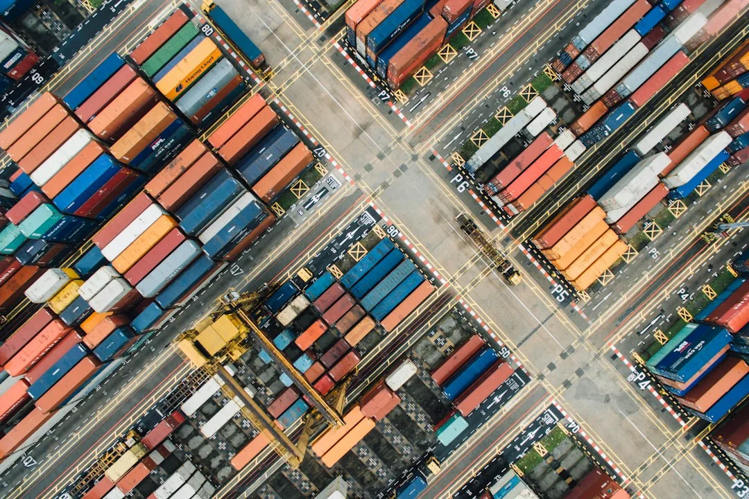 Aerial view of shipping containers and transport lanes